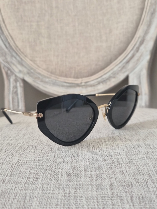 Miu Miu Black Cat-Eye Sunglasses with Gold Bridge